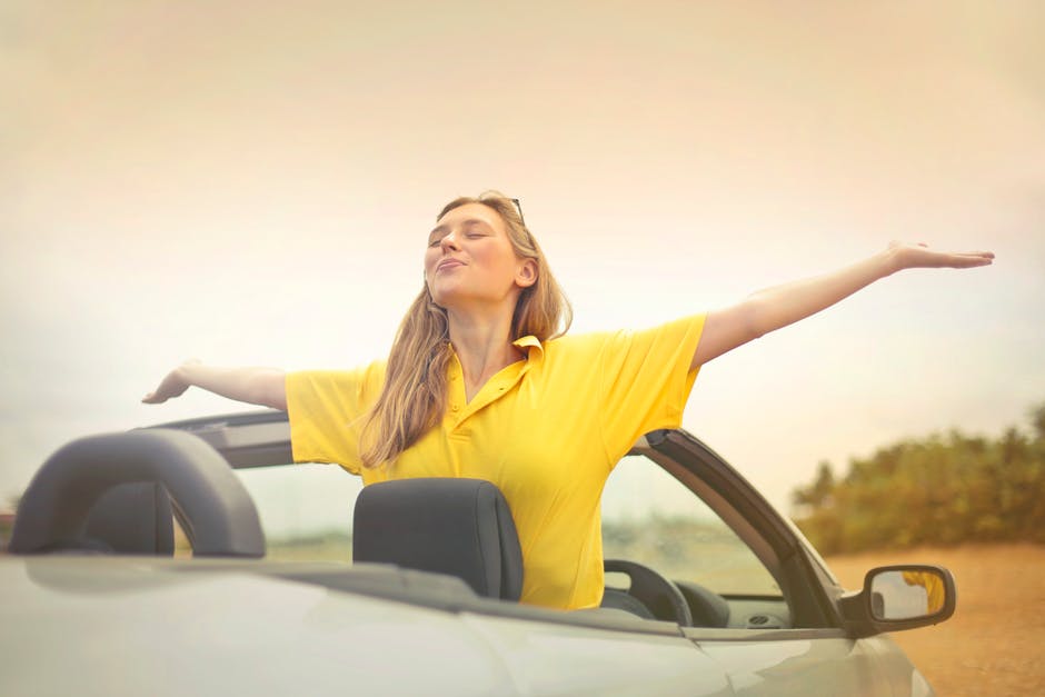 woman in convertible