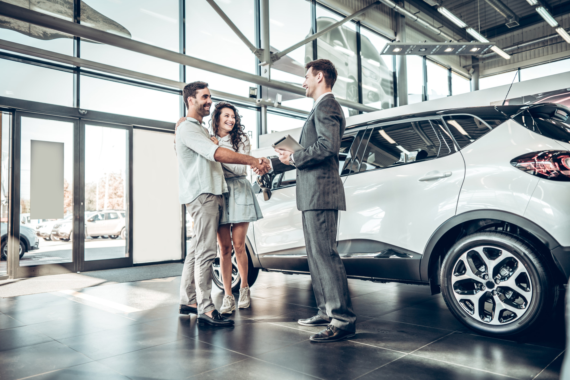 couple buying a car