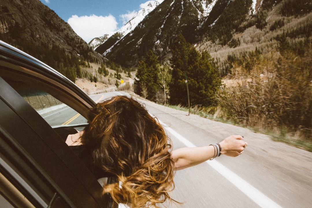 People in a Car on a Rod Trip